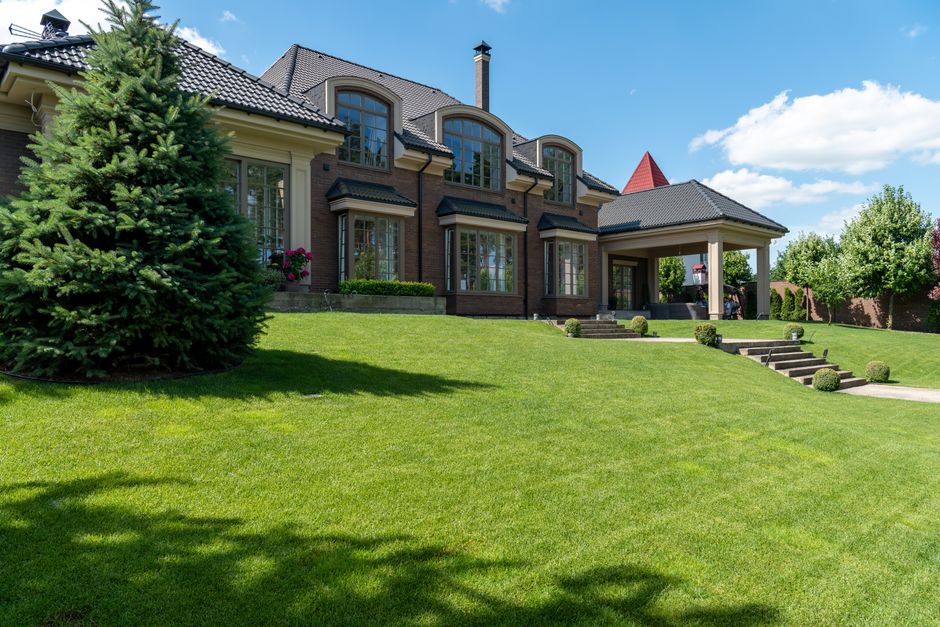 Perfectly manicured green lawn and landscape design
